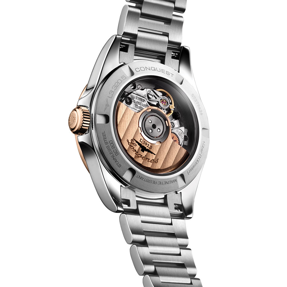 Conquest 30mm - Silver w/ Pink Gold Bezel on Bracelet
